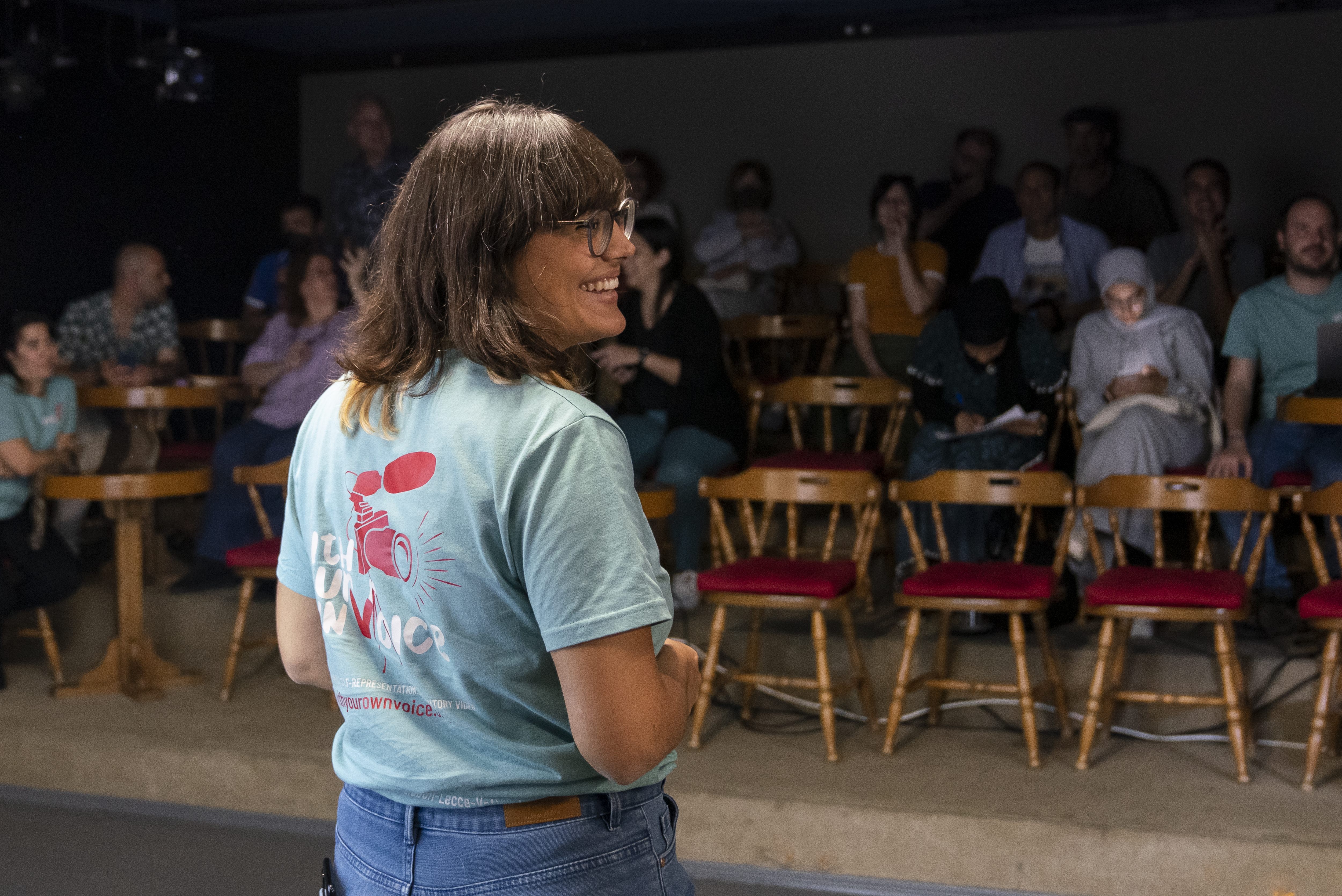 Micaela Lafratta facilitating a workshop with an audience